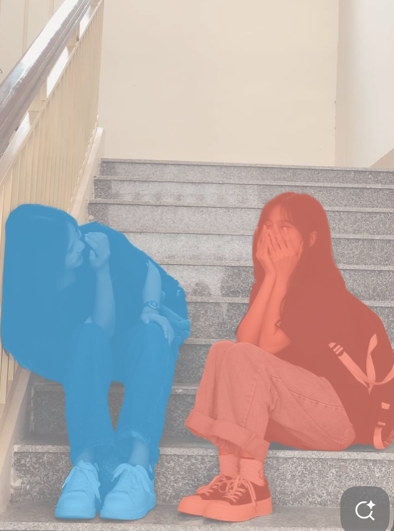Vision tinting two people with a gap as two separate foreground shapes, blue and red.